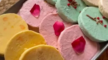 Roll cut kulfi in four flavours, sliced and served